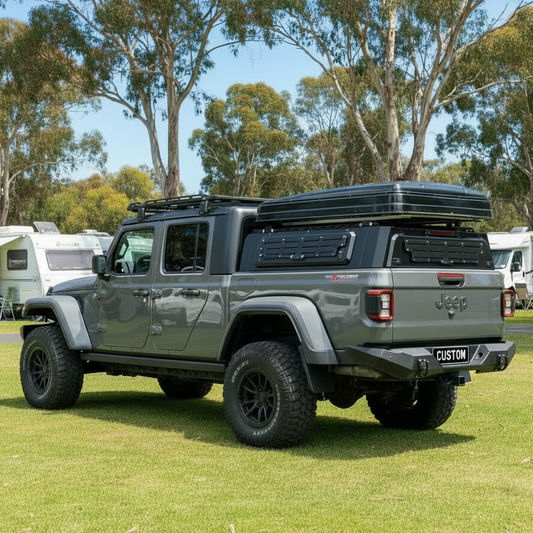 Silver Jeep truck with custom canopy low profile canopy