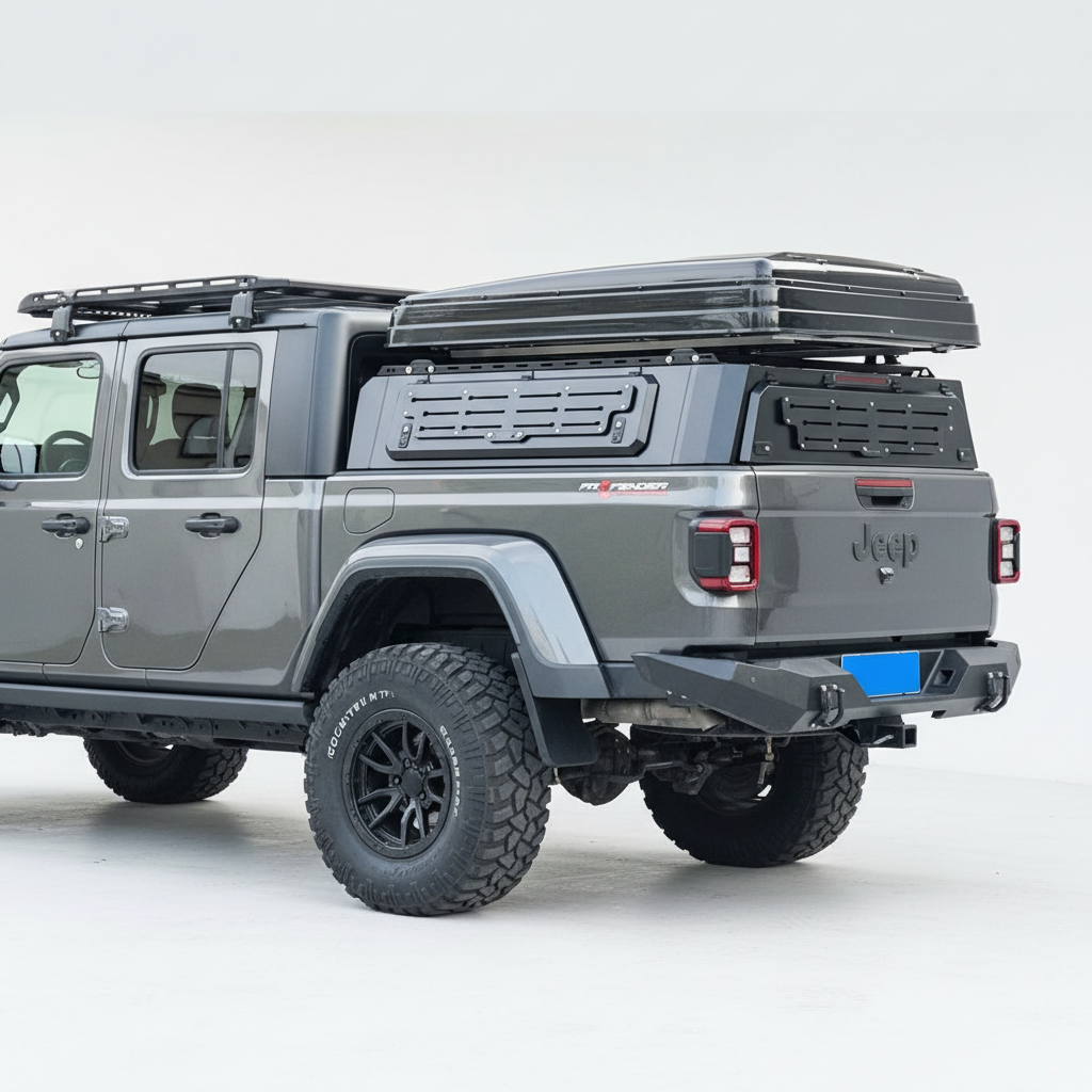 Silver off-road ute with a hard roof rack canopy on a street.