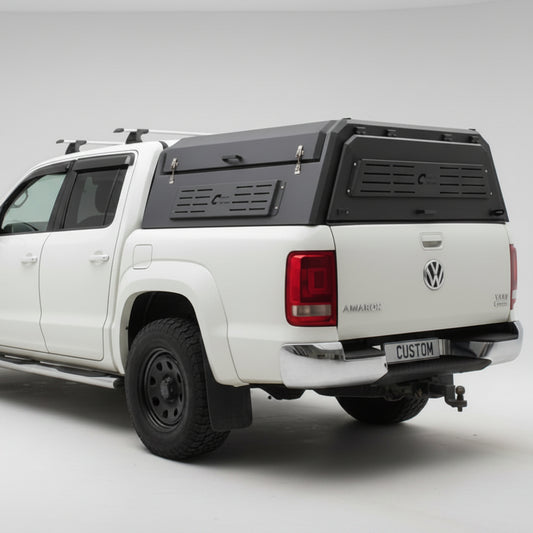 custom canopies STEALTH CAMPER canopy on a white volkswagen amarok