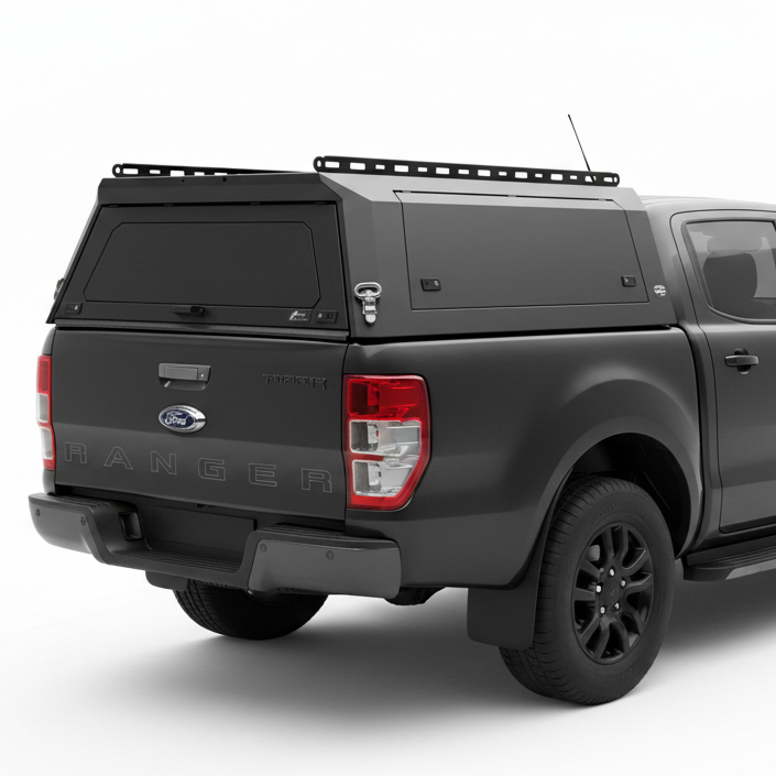 Black Ford Ranger truck with a custom canopy on a white background
