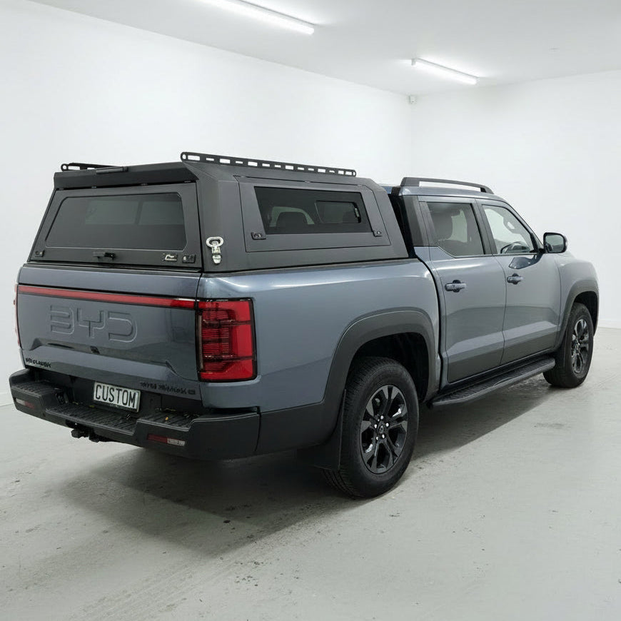 blue BYD shark 6 with a custom canopies modular ute canopy