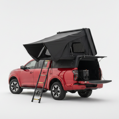 Red truck with a black custom canopies stealth camper with rooftop tent on a white background